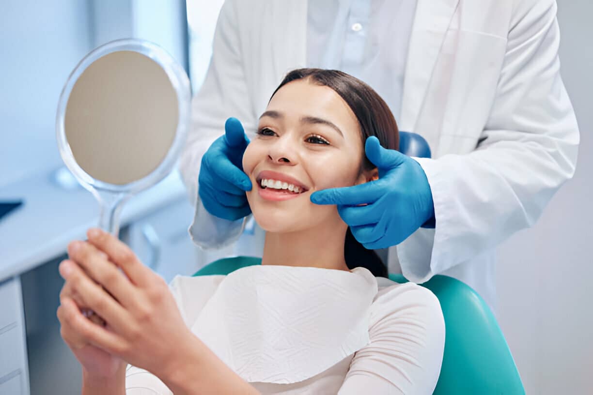 Dentist consulting with a patient